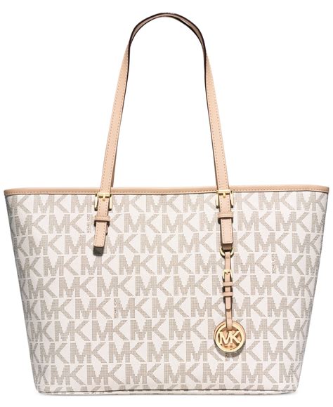 michael kors jet set travel top zip tote white|michael kors bag with airplanes.